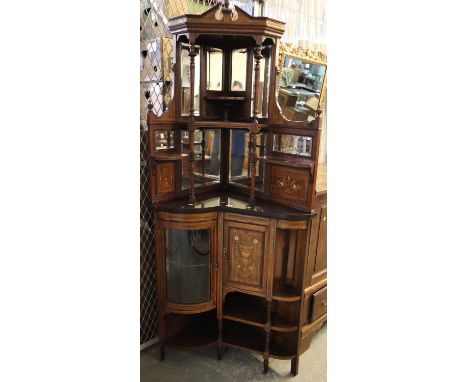 Late Victorian rosewood inlaid two stage corner cabinet, the top with an arrangement of bevelled mirrors above a bow front gl