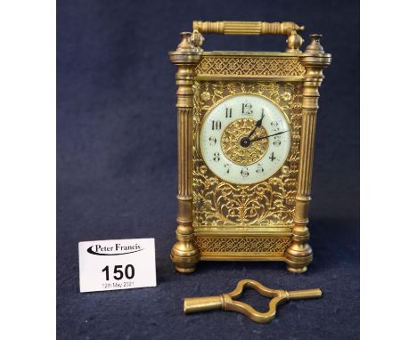 French gilt metal carriage clock in gorge type decorative case with fluted pillars and pierced foliate side panels, Arabic nu