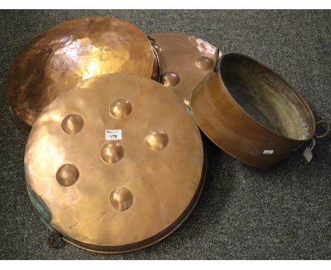 Three vintage two handled copper pans, together with another copper pan of oval form. (4)(B.P. 21% + VAT) 