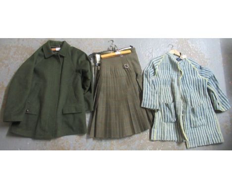 Three items of vintage clothing to include; a mid Century alpaca and wool green jacket with check lining, leather covered but