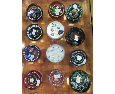 Tray of glass mostly floral design paperweights to include; various Caithness including; 'Christmas Rose' 131/500, 'Marguerit