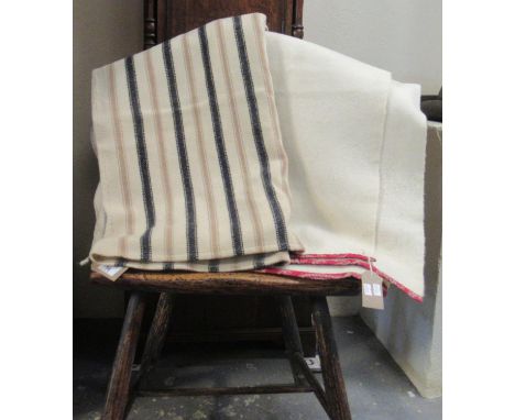 Two antique narrow loom Welsh woollen blankets; one with a narrow alternating black and light brown stripe with 'Carthenni, T