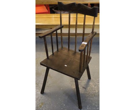 Welsh primitive style stick back kitchen armchair on moulded seat with tapering legs. (B.P. 21% + VAT) 