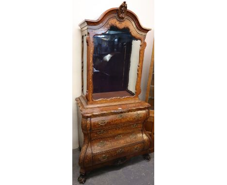 Early 19th Century Dutch marquetry cabinet upon bombe commode, the arch top cabinet with single glazed door, the commode base