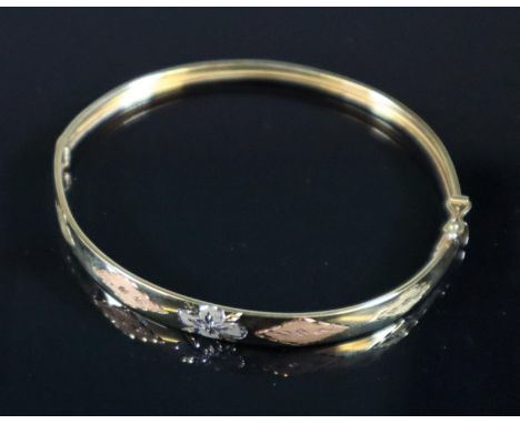 9ct three colour gold engraved bangle.  Approx weight 5.7 grams.(B.P. 21% + VAT) 