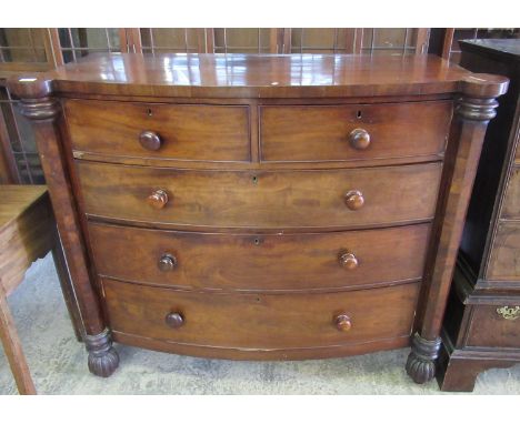 Victorian mahogany bow front chest of two short and three long drawers flanked by two pilasters on fluted feet. (B.P. 21% + V