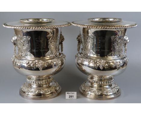 A pair of sterling silver wine coolers by Garrard to commemorate the silver wedding anniversary 1947 - 1972 of Her Majesty Qu