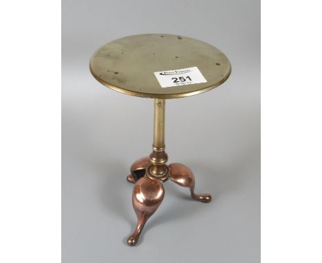 Brass and copper trivet stand in the form of a tripod table.(B.P. 21% + VAT) 