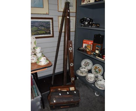 A 19th/20th Century stained wood tripod stand, 156cm tall, a vintage spirit level, and a cased Dumpy level by J.Halden &amp; 