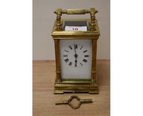 A French brass five glass carriage clock, having Roman numerals to face, with key.