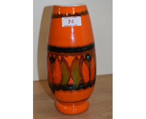 A mid century Poole Pottery vase, having orange ground with green,red and black abstract pattern.