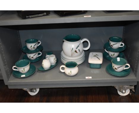 A collection of Denby tableware, having white ground with green interior and wheat sprig pattern to front, including jug, but
