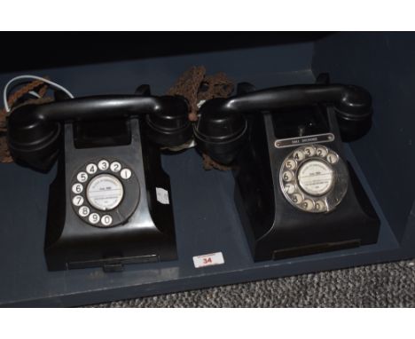 Two vintage mid century rotary dial telephones, having been converted.