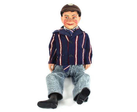 A mid 20th Century ventriloquist's dummy, attributed to Leonard Insull, the papier-mâché head with moving eyebrows, eyes and 