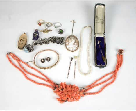 A Victorian coral necklace, centred by a floral arrangement to a three-row bead necklace with oval cluster clasp, a 9ct gold 