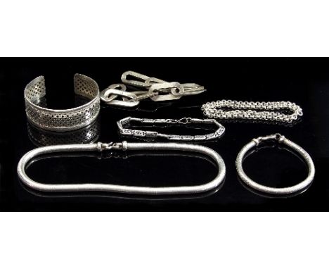 An Indian white metal snake-link necklace and bracelet, a bangle with trellis pierced decoration marked 925, two further brac