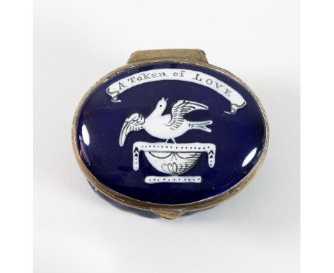A Bilston enamel patch box, the cover decorated a dove and the motto 'A Token of Love' to a cobalt blue ground, 4cm wide