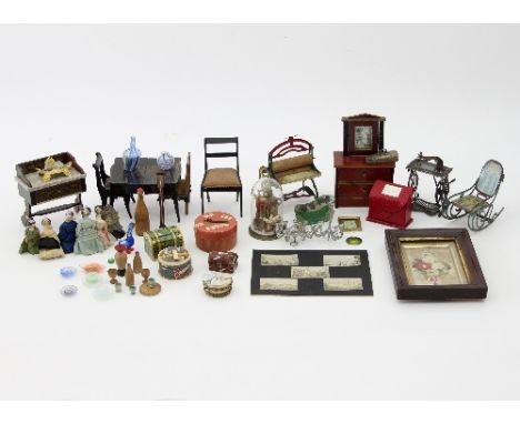 A quantity of dolls house furniture and furnishings, including items by Waltershausen, dressing table, mangle, candelabra, ro