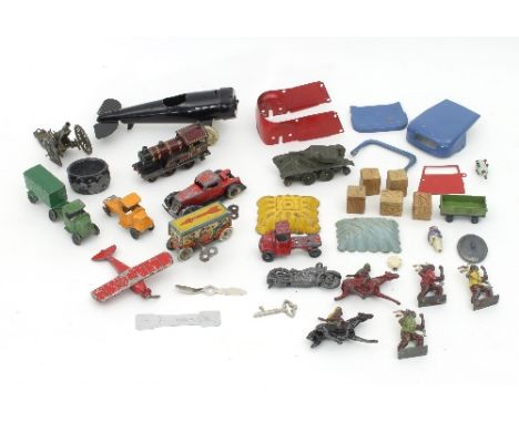 A group of tinplate toys to include a Triang aircraft, a Dinky tank, a Britains cannon, a Tootsie aircraft, a Johill Co. moto