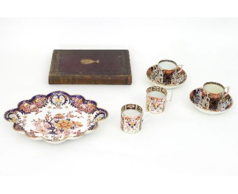 Three Derby Imari coffee cans and two saucers, a lobed lozenge dish, circa 1810, a modern coffee can and a copy of The Old De