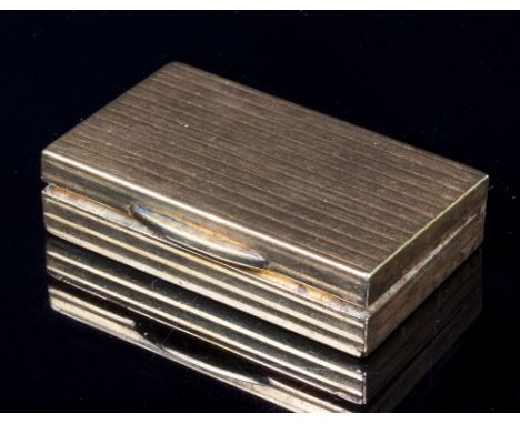 A 9ct gold pill box, G H R, Birmingham 1987, of reeded rectangular form, 4cm wide, approximately 24gm Condition Report: Hinge