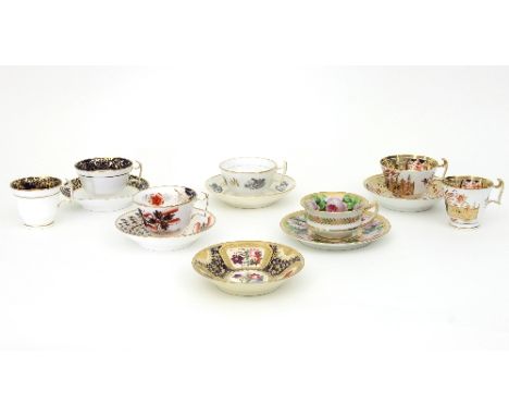 Two Spode trios and a teacup and saucer, circa 1810, with two further teacups and saucers and a saucer
