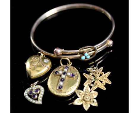 A 9ct gold bangle with turquoise bead set clasp, a 15ct gold heart-shaped locket set with a single diamond, an oval locket wi