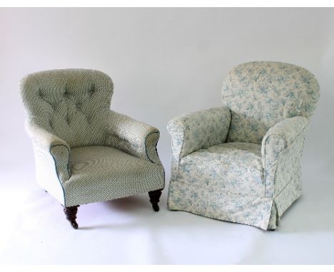 A button back armchair on turned legs with castors and another armchair with blue and white floral cover