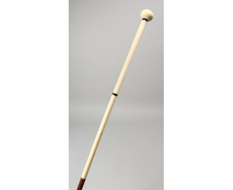 A GEORGIAN IVORY AND WOOD WALKING STICK. 36ins long.