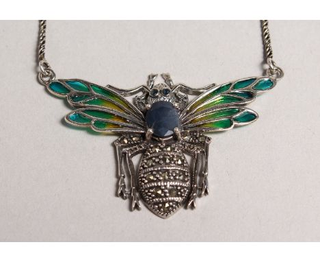 A SILVER SAPPHIRE SET BEE PENDANT on chain.