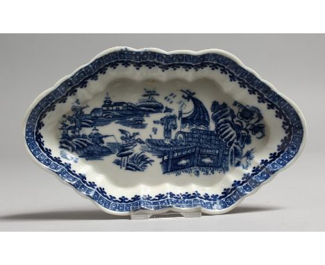 AN 18TH CENTURY CAUGHLEY SPOON TRAY, decorated with two scenes of a Chinoiserie oriental figure in a landscape, two impressed