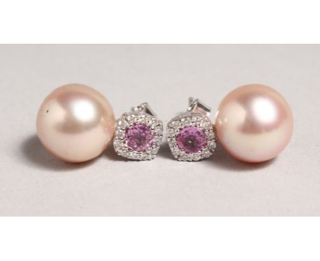 A PAIR OF 11MM PINK PEARL AND PINK SAPPHIRE STUDS set in 18ct white gold.
