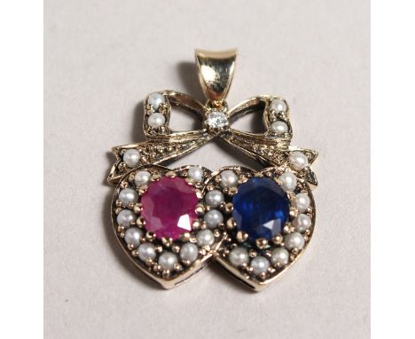 A 9CT GOLD, RUBY, SAPPHIRE, PEARL AND DIAMOND SWEETHEART PENDANT.
