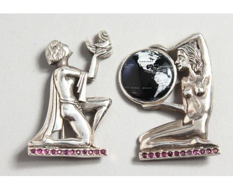 TWO SILVER RUBY SET DECO BROOCHES.