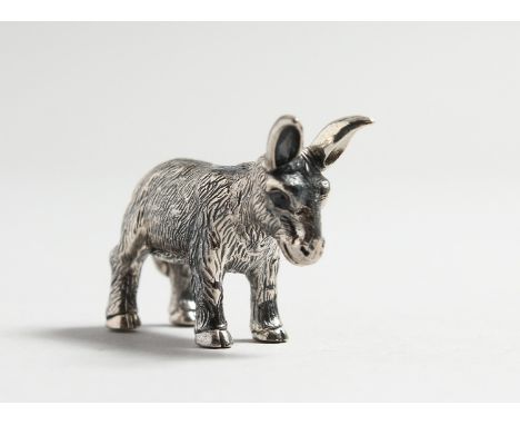 A CAST SILVER DONKEY.
