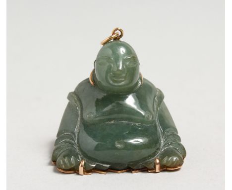 A GOOD CHINESE CARVED JADE GOLD MOUNTED BUDDHA. 1.5ins high.