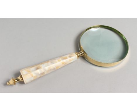 A NOVELTY MAGNIFYING GLASS with mother-of-pearl handle.