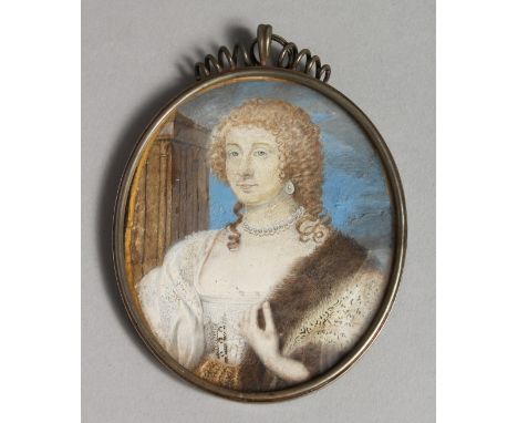 17TH CENTURY ENGLISH SCHOOL EARLY PORTRAIT MINIATURE OF A LADY in a silver frame. 3.25ins x 2.75ins.