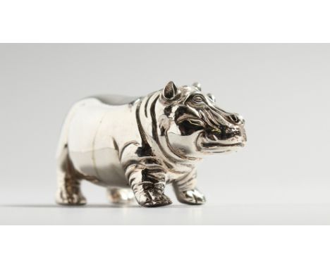 A CAST SILVER HIPPO.