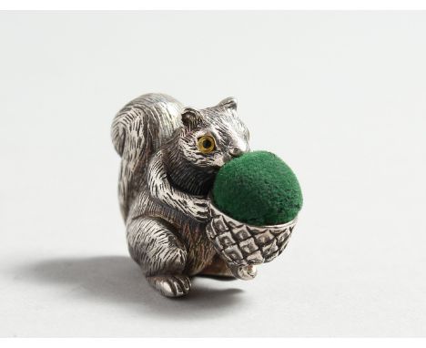 TWO SILVER SQUIRREL PINCUSHIONS.