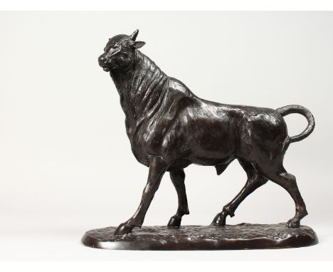 ANTOINE-LOUIS BARYE (1796-1875) FRENCH A CAST BRONZE MODEL OF A BULL, standing on a naturalistic base. 16.5ins long.