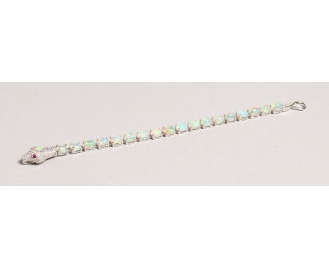 A SILVER OPAL SET SNAKE LINE BRACELET.