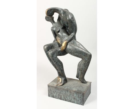 AN ABSTRACT BRONZE OF LOVERS. 17ins high.