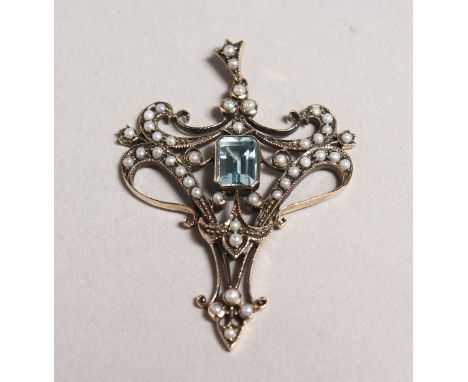 A 9CT GOLD BLUE TOPAZ AND PEARL PENDANT AND CHAIN.