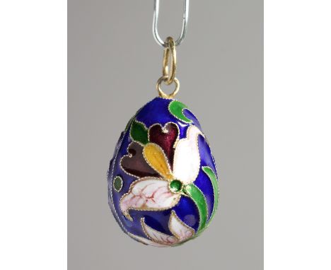 A RUSSIAN SILVER AND ENAMEL EGG PENDANT.