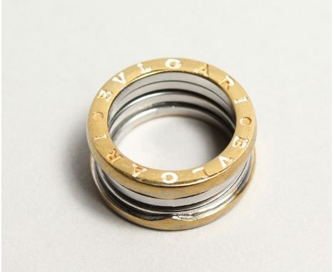 A BULGARI TWO COLOUR GOLD RING.