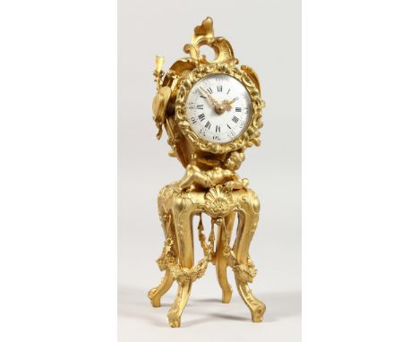 A GOOD MINIATURE LOUIS XVI STYLE ORMOLU LONGCASE CLOCK, with drum movement, the case with figures, shell motifs, on curving l