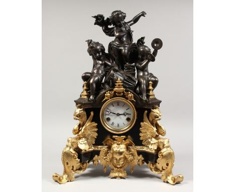 A VERY GOOD FRENCH BRONZE AND ORMOLU CLOCK, with three bronze cupids and gilt bronze and ormolu mounts. 23ins high.