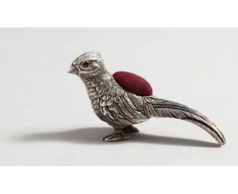 A SILVER PHEASANT PINCUSHION.