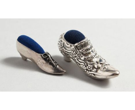 TWO SILVER SHOE PINCUSHIONS.